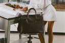 <h1>Made To Carry More</h1><h6>A carryall that keeps up. </h6><h6>Designed for traveling in style.</h6>