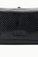 Black snake-embossed clutch front panel with embossed logo under flap