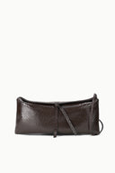 EVE clutch in dark brown snake-textured finish, with wrist strap and drawstring tie