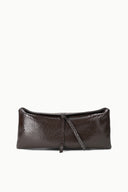 EVE clutch in dark brown snake-textured leather, rectangular shape with wrist strap