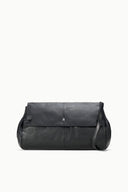 Black oversized bag with front flap and short shoulder strap