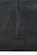 Black leather bag with STAUD logo patch centered on front panel