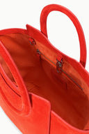 Maude mini tote bag interior view in tangelo red, zippered pocket with metal pull