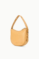 Levi cashew hobo bag angled side view with zip pocket detail