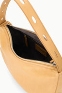 Levi cashew hobo bag open interior with black lining, zip and inner label