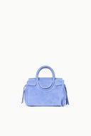 Light blue mini carryall handbag with structured top handles and side tassels