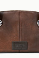 HESTER mini shoulder bag logo patch on distressed espresso brown leather panel