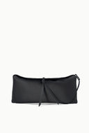 Black clutch bag with smooth finish, drawstring tie closure, and wrist strap