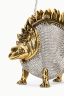 Mini dino chainmail bag close-up with gold tone dino head and mesh chainmail body
