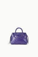 Mini carryall handbag in deep purple croc-embossed leather, angled front with side ties