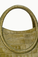 Olive croc-textured top handle with curved opening detail