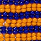 Blue and orange striped beaded bottle opener handle detail