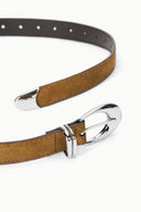Brown suede belt with silver buckle and metal keeper, detailed close-up.