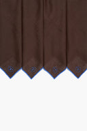 Set of linen napkins with blue-edged hems and small blue elephant icons