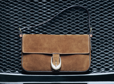 a tan suede handbag