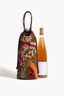 Beaded wine bottle bag with drawstring opening, multicolor abstract pattern; bottle shown