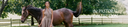 Woman in a dress sitting next to a horse in a pastoral setting with 'the Pastoral Collection' branding.