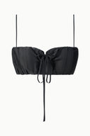 Black silk bandeau top with center bow and long neck tie ends
