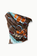 Silk one-shoulder top with draped cowl neckline, brown orange turquoise butterfly print