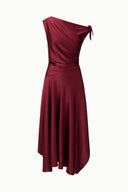 Portia silk midi dress in deep burgundy with one-shoulder drape and neckline tie
