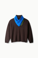 Brown knit sweater with cowl neck and blue-green multicolor scarf detail