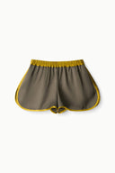 Dark gray satin shorts with yellow piping and drawstring waist