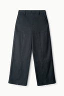 Black wide-leg pants with belt loops and front creases