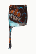 Printed mini skirt with butterfly-sky abstract print, high slit, gathered waist.