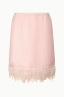 Light pink satin skirt with elastic waistband and feather fringe hem