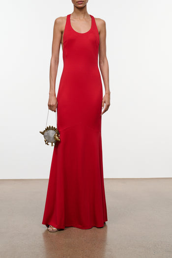 Red sleeveless maxi dress with scoop neck, fitted waist, and flowing skirt