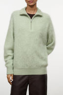 Spearmint cashmere half-zip sweater with zip collar, ribbed cuffs and hem