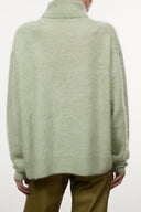 Spearmint cashmere sweater with high turtleneck and full back view, long sleeves