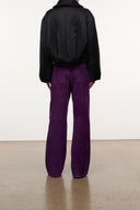 Gus suede pants in amethyst purple, back view with relaxed straight legs