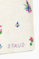 Off-white beaded tote bag with colorful butterflies and purple stitched logo