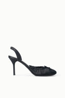 Black slingback high-heel pump with bow detail at the toe and slender stiletto heel