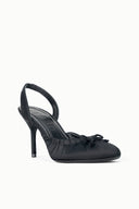 Black slingback high-heel pump with ruched upper and bow at the toe, stiletto heel