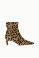 A pointed-toe ankle boot with a leopard print pattern in tan and black, featuring a mid-height stiletto heel, shown against a plain white background.
