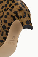 Cheetah-print ankle boot interior and heel detail with low block heel