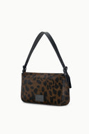 Leopard-print mini bag with flap and short shoulder straps, logo patch on front.