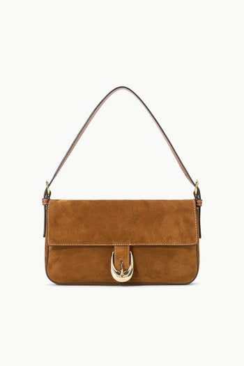 Tan suede Harlow bag with structured front flap, metal horseshoe clasp, and handles