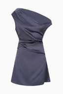 Navy silk mini dress with draped one-shoulder neckline and fitted waist