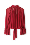 Pomegranate red sheer blouse with pleated ruffled high neck and tiered cuffs