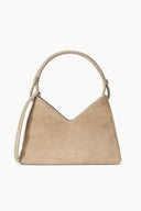 Beige suede shoulder bag with short top handles and V-shaped stitched front panel