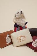 <p>Keep your furry friends with you on the go. Perfect for travel, the Shirley pouch can be customized with one or two pet portraits. </p>