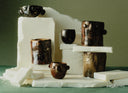 <p>Simple silhouettes and expressive faces, made by hand.</p>