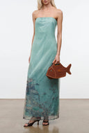Amara strapless maxi dress with teal floral print and sheer flowing fabric
