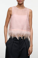 Sheer pink sleeveless camisole top with round neck and feather fringe hem