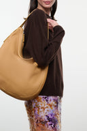 Levi hobo bag in cashew tan with zip-top and curved shoulder strap