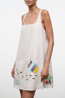 Natural linen shift dress, sleeveless with square neckline, colorful print at hem