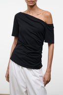 Black one-shoulder draped top with short sleeves
